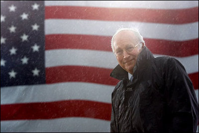 Vice President Dick Cheney stands in a steady rain during a rally at Fort Campbell Army Base in Fort Campbell, Ky., Monday, October 16, 2006. The Vice President visited Fort Campbell to welcome home over 4,000 troops from the 101st Airborne Division who returned in September from a tour of duty in Iraq.