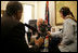 Vice President Dick Cheney talks with Juan Williams, left, of National Public Radio during a taped radio interview in the Vice President's office during the White House Radio Day, Tuesday, October 24, 2006.