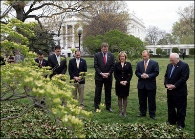 Vice President Dick Cheney stands with Oklahoma City Mayor Mick Cornett, second right, and the Oklahoma Congressional delegation Thursday, April 19, 2007, during a moment of silence on the South Lawn of the White House to commemorate the April 19, 1995 bombing of the Alfred P. Murrah Federal Building in Oklahoma City. The moment of silence was observed in front of a White Dogwood tree planted by former President Bill Clinton and Mrs. Hillary Clinton in honor of the 168 people who lost their lives in the tragedy.