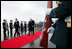 Vice President Dick Cheney walks the red carpet upon his arrival to Haneda International Airport in Tokyo, Tuesday, February 20, 2007. The Vice President is scheduled to meet senior Japanese officials and visit U.S. military personnel before traveling to Australia later in the week.