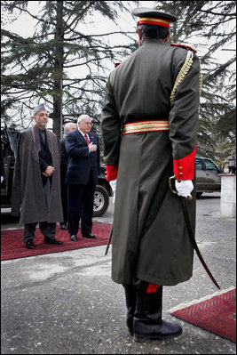 Vice President Dick Cheney stands with Afghan President Hamid Karzai, Tuesday, Feb. 27, 2007 during an arrival ceremony at the presidential palace in Kabul. The Vice President made an unannounced visit to Afghanistan to discuss regional issues and the global war on terror.