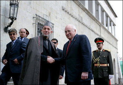 Vice President Dick Cheney shakes hands with Afghan President Hamid Karzai, Tuesday, Feb. 27, 2007 as the two leaders met at the presidential palace in Kabul to discuss regional issues.
