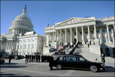 A military honor guard descends the steps of the Senate carrying the casket of former President Gerald R. Ford from the Capitol to an awaiting hearse, Tuesday, January 2, 2007, for the procession to the State Funeral at the National Cathedral in Washington, D.C.