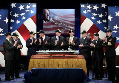 Vice President Dick Cheney, second left, is joined by government officials and family members of former President Gerald R. Ford in applause during a naming ceremony for the new U.S. Navy aircraft carrier, USS Gerald R. Ford, at the Pentagon in Washington, D.C., Tuesday, Jan. 16, 2007. The nuclear-powered aircraft carrier will be the first in the new Gerald R. Ford class of aircraft carriers in the U.S. Navy. Pictured from left to right are Secretary of the Navy Donald Winter, Vice President Dick Cheney, Susan Ford Bales, Steve Ford, Jack Ford, Michael Ford, Senator John Warner, R-Va., Senator Carl Levin D-Mich., and Chief of Naval Operations, Admiral Mike Mullen.
