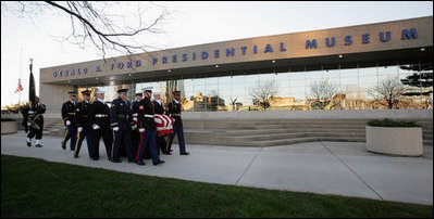 A military honor guard carries the casket of former President Gerald R. Ford during interment ceremonies on the grounds of the Gerald R. Ford Presidential Museum in Grand Rapids, Mich., Wednesday, January 3, 2007.