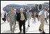 Vice President Dick Cheney walks with General David Petraeus, Commander of U.S. forces in Iraq, upon arrival to Baghdad Wednesday, May 9, 2007. The Vice President began a trip to the Middle East with an unannounced visit to Iraq to meet with Iraqi officials and U.S. leadership. 