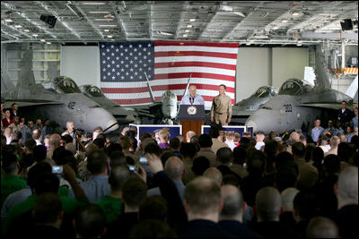 Vice President Dick Cheney addresses U.S. troops during a rally, Friday, May 11, 2007, aboard the aircraft carrier USS John C. Stennis in the Persian Gulf. "I've been around for a while -- so long, in fact, that I even knew Senator John Stennis personally," said the Vice President, adding, "but I've never been more proud of the United States military than I am today. It's an incredibly challenging time for the country, and there's serious work being done on many fronts. You're doing all that we ask of you, and you're doing it with skill and with honor." 