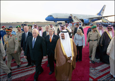 Upon arrival Saturday, May 12, 2007, to King Faisal Air Base in Saudi Arabia Vice President Dick Cheney walks with Saudi Crown Prince Sultan bin Abdulaziz, right, and an interpreter. The visit to Saudi Arabia is the third stop on a five-country trip to the Middle East.