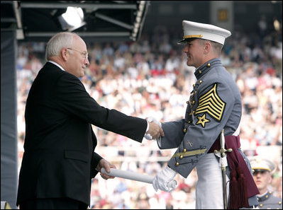 Vice President Dick Cheney presents a diploma to a U.S. Military Academy graduate during commencement ceremonies at Michie Stadium Saturday, May 26, 2007, in West Point, N.Y. 