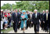 Vice President Dick Cheney accompanies Her Majesty Queen Elizabeth II of England Friday, May 4, 2007, on a tour of Jamestown Settlement in Williamsburg, Virginia. The Queen's visit comes during the 400th anniversary celebrations at Jamestown, the first permanent English settlement in North America.