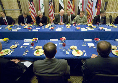 Vice President Dick Cheney is joined by U.S. officials during a lunch with Prime Minister Nouri al-Maliki of Iraq, and Iraqi Cabinet members Wednesday, May 9, 2007 at the U.S. Embassy in Baghdad. 