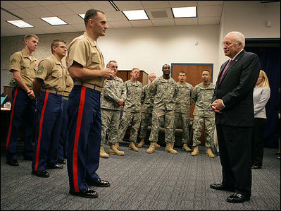 Vice President Dick Cheney talks with U.S. Marine Major Dan Whisnant Friday, Sept. 14, 2007, during a meeting with Marines of Alpha Company, 1st Batallion, 24th Regiment, left, and members of Michigan's Army National Guard, right, at the Gerald R. Ford Library and Museum in Grand Rapids, Mich. The Vice President thanked the troops for their service in Iraq and called their work with Iraqi tribal leaders a "great success story."