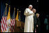 Pope Benedict XVI is joined by Vice President Dick Cheney and Mrs. Lynne Cheney for a farewell ceremony in honor of the Pope, Sunday, April 20, 2008 at John F. Kennedy International Airport in New York. During the ceremony the Vice President said, "Your presence has honored our country. Although you must leave us now, your words and the memory of this week will stay with us. For that, we are truly and humbly grateful."