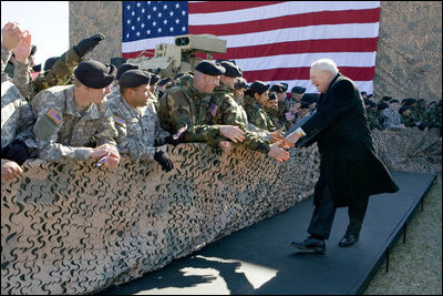 Vice President Dick Cheney greets U.S. Army troops Tuesday, Feb. 26, 2008 during a rally for the First Cavalry Division at Fort Hood, Texas.
