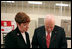 Vice President Dick Cheney examines an economic stimulus check Thursday, May 8, 2008, while on a tour of the Philadelphia Regional Financial Center with Director Betty Belinsky in Philadelphia. Through the summer months the Philadelphia Regional Financial Center will print over 11 million checks for disbursement to U.S. citizens as part of the Economic Stimulus Act of 2008.