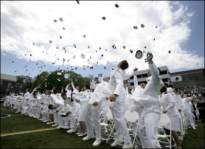 U.S. Coast Guard Academy graduates toss their hats into the air in celebration, Wednesday, May 21, 2008 during commencement ceremonies in New London, Conn.