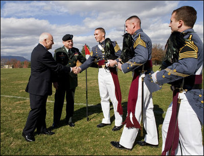 Vice President Dick Cheney greets members of the Virginia Military Institute regimental staff Saturday, Nov. 8, 2008, during Military Appreciation Day at VMI's Parade Ground in Lexington, Va.