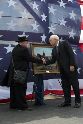 Re-enactment participant Jack Fishman presents Vice President Dick Cheney with an oil painting on September 19, 2008, depicting Cheney's great-grandfather Samuel Fletcher Cheney at the Battle of Chickamauga. Cheney's great-grandfather fought in the 1863 Civil War battle as a Captain in the 21st Ohio Volunteer Infantry.