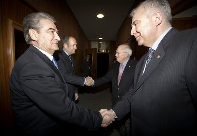 Vice President Dick Cheney greets Macedonian Prime Minister Vlado Buckovski, background left, as Albanian Prime Minister Sali Berisha, foreground left, shakes hands with Croatian Prime Minister Ivo Sanader, Sunday, May 7, 2006, before a meeting in Dubrovnik, Croatia.