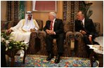 Vice President Dick Cheney and former President George H.W. Bush talk with newly crowned King Abdullah of Saudi Arabia, following the recent death of King Fahd, Friday, August 05, 2005. The vice president led a delegation to pay respects and offer condolences.