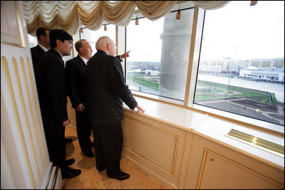 From a high window in the Presidential Palace, Kazakh President Nursultan Nazarbayev points out places of interest along the Astana, Kazakhstan skyline, Friday, May 5, 2006.