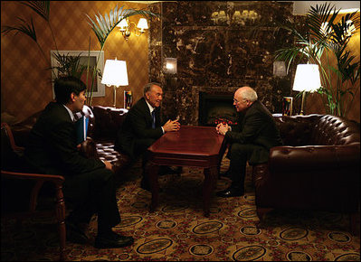 With the aid of an interpreter Vice President Dick Cheney and Kazakh President Nursultan Nazarbayev spend a final moment to talk alone before concluding meetings in Astana, Kazakhstan, Friday, May 5, 2006.
