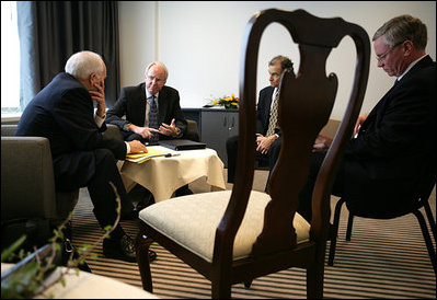 Vice President Dick Cheney, far left, meets with his advisors and US Ambassador to Bulgaria John Beyrle, center left, prior to a bilateral meeting with Bulgarian President Georgi Purvanov held during the Vilnius Conference 2006 in Vilnius, Lithuania, Thursday, May 4, 2006.