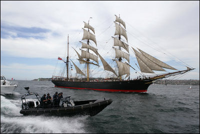 A clipper ship and an Australian security boat travel alongside Vice President Cheney and Australian Prime Minister John Howard as they cruise Sydney Harbor, Feb. 24, 2007. White House photo by David Bohrer