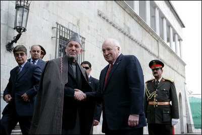 Vice President Dick Cheney stands with Afghan President Hamid Karzai, Feb. 27, 2007, during an arrival ceremony at the presidential palace in Kabul. The Vice President made the visit to Afghanistan to discuss regional issues and the global war on terror. White House photo by David Bohrer