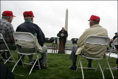 Vice President Dick Cheney addresses veterans from the 526th Armored Infantry Battalion Friday, October 7, 2005, after a wreath-laying ceremony at the National World War II Memorial in Washington. During his remarks the vice president said, "I count it a privilege to stand in the presence of men who were sent into battle by President Franklin D. Roosevelt...and who, by your courage and honor and devotion to duty, helped to win a war and change the course of history."