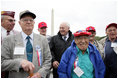 Vice President Dick Cheney poses for a photo with veterans from the 526th Armored Infantry Battalion Friday, October 7, 2005, after delivering remarks during a wreath -laying ceremony at the National World War II Memorial in Washington. The 526th AIB is the sole remaining, separate armored infantry battalion from World War II, whose soldiers defended the Belgian villages of Stavelot and Malmedy on December 16, 1944, the first day of the Battle of the Bulge.