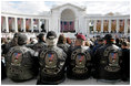 A group of veterans wearing vests depicting the branches of the Armed Forces they served attend ceremonies Friday, Nov. 11, 2005, during Veterans Day events at Arlington National Cemetery in Arlington, Va.