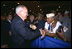 Vice President Dick Cheney shakes hands with veterans after addressing the Veterans of Foreign Wars 103rd National Convention in Nashville, Monday, August 26, 2002.