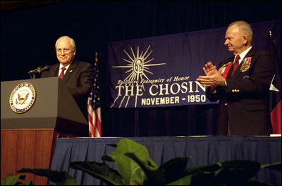 After being introduced by the president of The Chosin Few, Col. John Gray, right, Vice President Dick Cheney speaks to the organization of Korean War veterans in San Antonio, August 29, 2002.