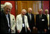 Vice President Dick Cheney meets with Plank Owners of the USS Bashaw on Capitol Hill Friday, May 28, 2004. During the meeting the vice president honored the Plank Owners for their service in World War II. A Plank Owner is an individual who served as member of the crew of a ship when that ship was placed in commission. The submarine USS Bashaw, commissioned on October 25, 1943, engaged in six wartime patrols in the Pacific.