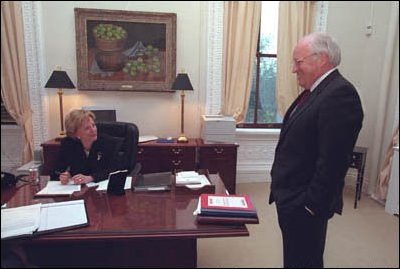 Taking a short break from work, the Vice President and Mrs. Cheney talk for a moment in her office. 