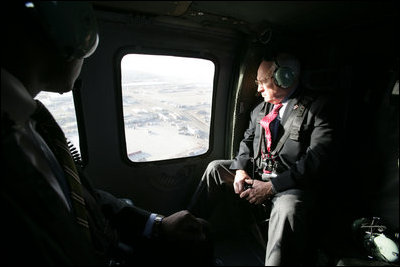Vice President Dick Cheney travels via Blackhawk helicopter to Baghdad International Airport for a one-day surprise visit to Iraq, Sunday Dec. 18, 2005.