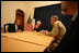 Vice President Cheney meets with US Ambassador to Iraq Zalmay Khalilzad, General George Casey and General John Abizaid in the Green Zone during a one-day surprise visit to Iraq, Sunday Dec. 18, 2005.