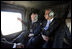 Vice President Dick Cheney and Zalmay Khalilzad, Ambassador to Iraq, depart from Taji Air Base at the 9th Infantry Division Headquarters via helicopter, Sunday Dec. 18, 2005.