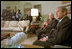 After a late afternoon arrival March 20, Vice President Dick Cheney meets with President George W. Bush and discusses his trip to the Middle East with the media in the Oval Office March 21.