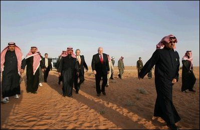 Vice President Dick Cheney and King Abdullah make their way through Saudi sands on the way to the King's desert camp outside Riyadh, Tuesday January 17, 2006.