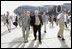 Vice President Dick Cheney walks with General David Petraeus, Commander of U.S. forces in Iraq, upon arrival to Baghdad Wednesday, May 9, 2007. The Vice President began a trip to the Middle East with an unannounced visit to Iraq to meet with Iraqi officials and U.S. leadership.