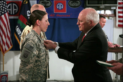Vice President Dick Cheney awards the Silver Star Medal to Army Specialist Monica Brown of Lake Jackson, Texas Thursday, March 20, 2008, following a dinner with U.S. troops at Bagram Air Base, Afghanistan. While serving as a combat medic in April of 2007, Spc. Brown, 19, showed extraordinary heroism when she used her body to shield wounded soldiers from enemy gunfire and mortar shelling, then moving them to safety after their convoy came under attack in Afghanistan’s eastern Paktia province. She is the second woman since World War II to receive the Silver Star. 