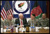 Vice President Dick Cheney shares a light moment with 19-year-old Silver Star Medal recipient U.S. Army Specialist Monica Brown, center right, during a dinner with U.S. troops Thursday, March 20, 2008 at Bagram Air Base, Afghanistan. Joining the Vice President and Spc. Brown are from left: TSgt. Vernon Jones; Army Commendation Medal for Valor recipient Spc. Charles Bell; and Spc. Brown’s brother, infantryman Justin Brown. 