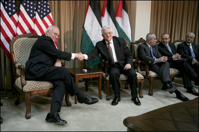 Vice President Dick Cheney and President Mahmoud Abbas of the Palestinian Authority shake hands Sunday, March 23, 2008, during their meeting at the Muqata in Ramallah. 