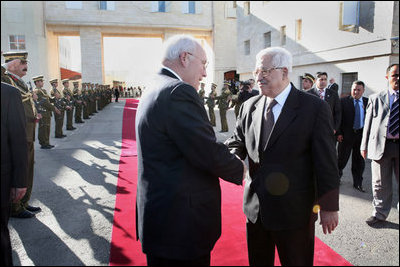 Vice President Dick Cheney shakes hands with Palestinian President Mahmud Abbas Sunday, March 23, 2008 upon departure from the Muqata in the West Bank city of Ramallah.