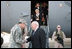 Vice President Dick Cheney is greeted by General David Petraeus, Commanding General of Multi-National Forces Iraq, as his wife Mrs. Lynne Cheney and daughter Liz Cheney deplanes in Baghdad, Monday, March 17, 2008. The visit is the Vice President's third to Iraq and comes during the fifth anniversary of the beginning of the U.S.-led campaign to liberate the Iraqi people.