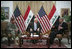 Vice President Dick Cheney participates in a classified briefing with U.S. Ambassador to Iraq Ryan Crocker, left, and Commanding General of Multi-National Forces Iraq General David Petraeus, right, in the Green Zone in Baghdad. Later in the day the Vice President ventured outside the Green Zone to meet with Iraqi leadership to discuss energy legislation, long-term security issues and the development of Iraqi diplomatic relationships with neighboring countries.