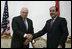 Vice President Dick Cheney shakes hands with Iraqi Prime Minister Nouri al-Maliki following their meeting Monday, March 17, 2008 at the Prime Minister's residence in Baghdad. "I found the Vice President a man who understands very well and is very keen about Iraq's success," said Prime Minister Maliki, adding, "I believe these visits really cement and support the relationship between the two countries, the success that we achieve in Iraq against terrorism, and in the war against terrorism."