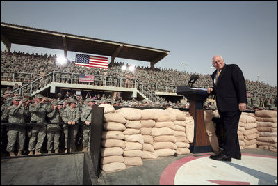 Vice President Dick Cheney receives a welcome Tuesday, March 18, 2008, to a rally for U.S. troops at Balad Air Base, Iraq.